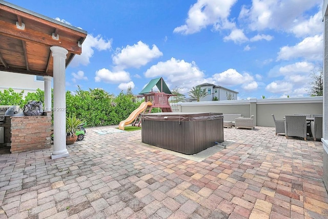 3521 Forest View Cir, Dania Beach, FL 33312 - view of patio / terrace featuring a playground, a hot tub, and a grill