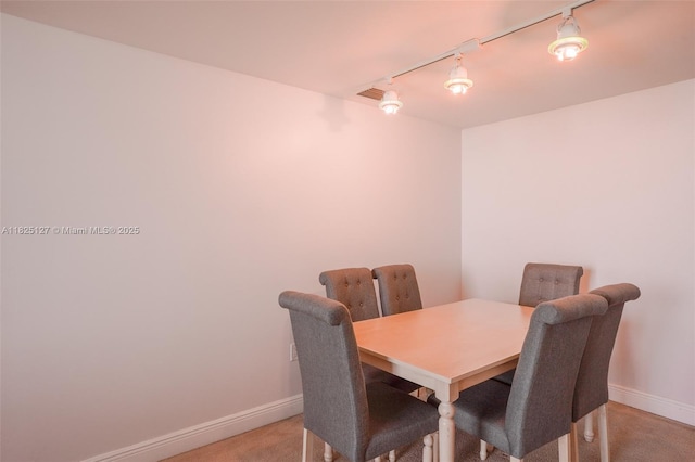 1250 S Miami Ave Unit 3003, Miami, FL 33130 - dining space featuring light carpet and rail lighting