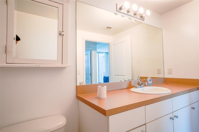 1250 S Miami Ave Unit 3003, Miami, FL 33130 - half bathroom featuring vanity and toilet