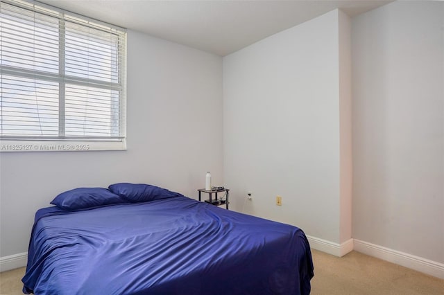1250 S Miami Ave Unit 3003, Miami, FL 33130 - bedroom featuring light carpet and baseboards