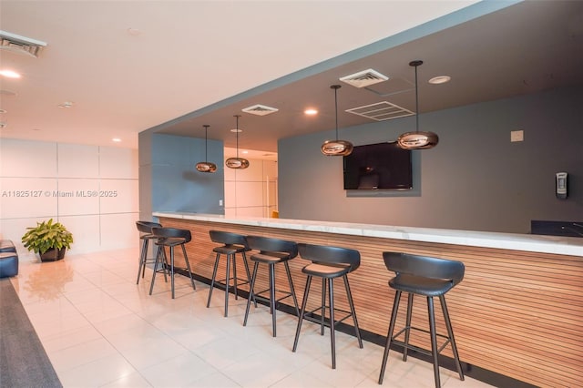 1250 S Miami Ave Unit 3003, Miami, FL 33130 - community bar area with decorative light fixtures, light tile patterned floors, tile walls, and recessed lighting