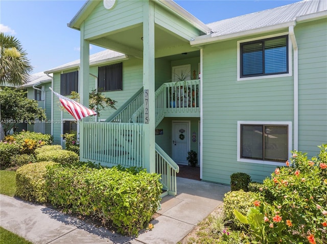 5725 Pelican Pointe, Sebastian, FL 32958 - view of front facade featuring stairway