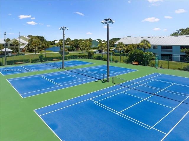 5725 Pelican Pointe, Sebastian, FL 32958 - view of tennis court featuring community basketball court