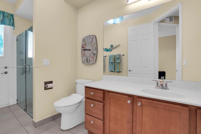 819 SW Bromelia Ter, Stuart, FL 34997 - bathroom with vanity, tile patterned flooring, and a stall shower