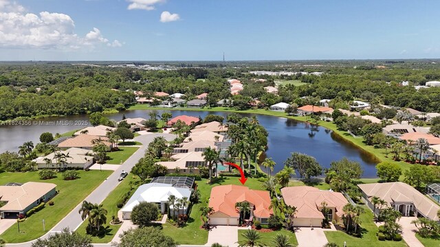 819 SW Bromelia Ter, Stuart, FL 34997 - aerial view of residential area featuring a large body of water