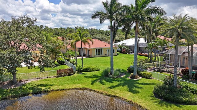 819 SW Bromelia Ter, Stuart, FL 34997 - view of yard featuring a water view