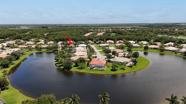 819 SW Bromelia Ter, Stuart, FL 34997 - aerial perspective of suburban area featuring a large body of water