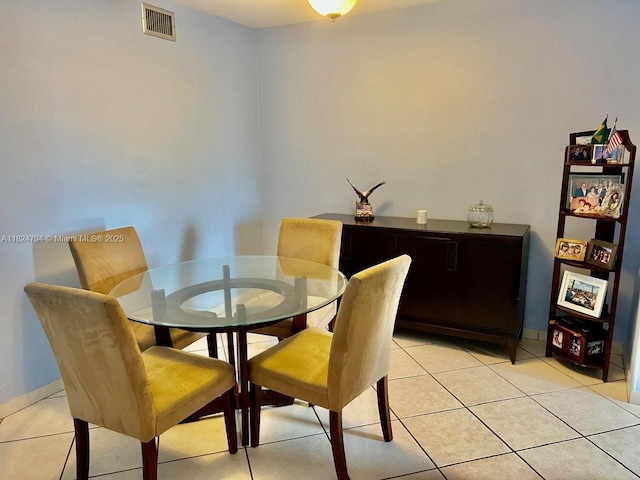 930 SE 9th Ave Unit 11, Pompano Beach, FL 33060 - dining space with light tile patterned floors