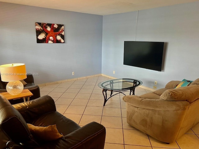 930 SE 9th Ave Unit 11, Pompano Beach, FL 33060 - living room featuring light tile patterned floors and baseboards