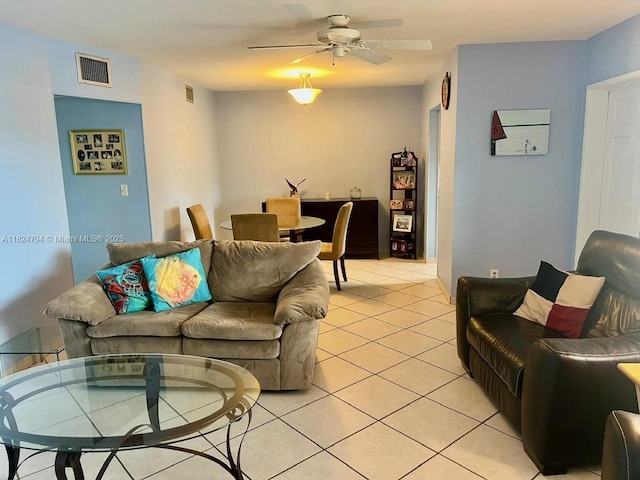 930 SE 9th Ave Unit 11, Pompano Beach, FL 33060 - living area featuring light tile patterned flooring and a ceiling fan
