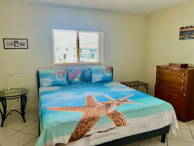 930 SE 9th Ave Unit 11, Pompano Beach, FL 33060 - bedroom with light tile patterned floors