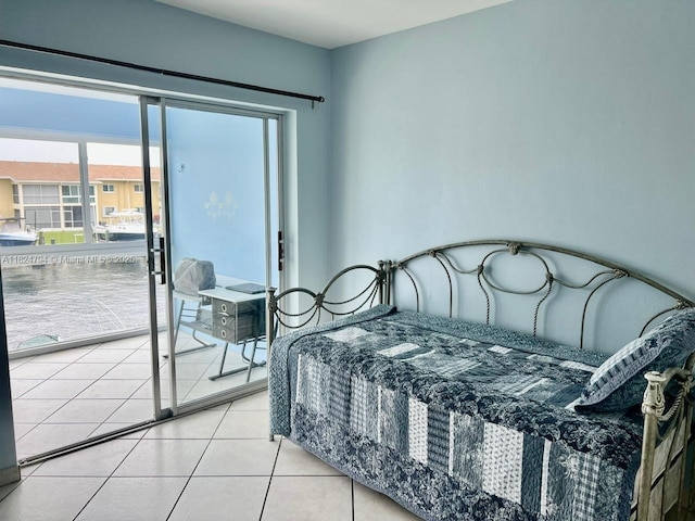 930 SE 9th Ave Unit 11, Pompano Beach, FL 33060 - tiled bedroom with access to exterior
