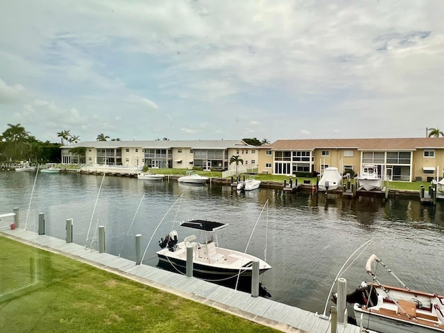 930 SE 9th Ave Unit 11, Pompano Beach, FL 33060 - dock area featuring a water view and a residential view