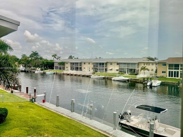 930 SE 9th Ave Unit 11, Pompano Beach, FL 33060 - water view with a boat dock and nearby suburban area