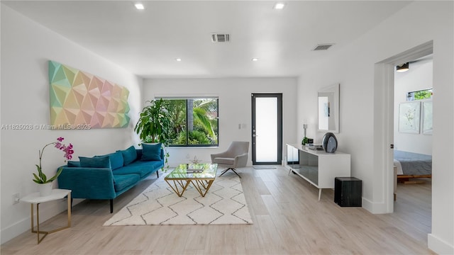 3020 SW 2nd Ave, Miami, FL 33129 - living area featuring light wood finished floors and recessed lighting