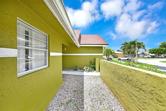 5610 NW 54th Ave, Tamarac, FL 33319 - view of property exterior with stucco siding