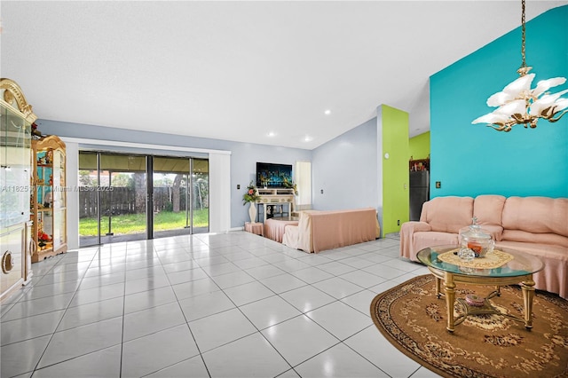 5610 NW 54th Ave, Tamarac, FL 33319 - tiled living room with lofted ceiling and a chandelier
