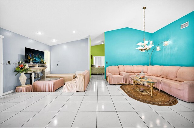 5610 NW 54th Ave, Tamarac, FL 33319 - tiled living room with vaulted ceiling and a chandelier