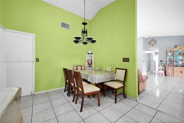 5610 NW 54th Ave, Tamarac, FL 33319 - dining room featuring a chandelier, high vaulted ceiling, and light tile patterned floors