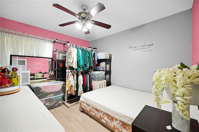 5610 NW 54th Ave, Tamarac, FL 33319 - bedroom with wood finished floors and ceiling fan