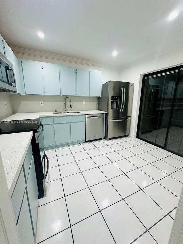 9510 SW 151st Ct, Miami, FL 33196 - kitchen with stainless steel appliances, light countertops, and light tile patterned floors