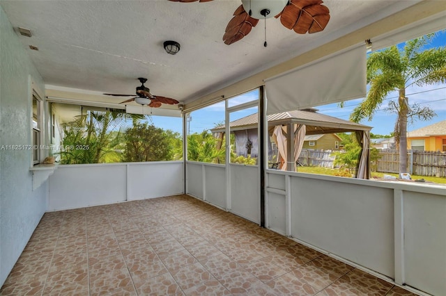 509 SW Hamburg Ter, Port St Lucie, FL 34984 - unfurnished sunroom with a ceiling fan