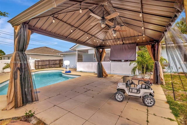 509 SW Hamburg Ter, Port St Lucie, FL 34984 - view of pool with a gazebo, a ceiling fan, and a patio