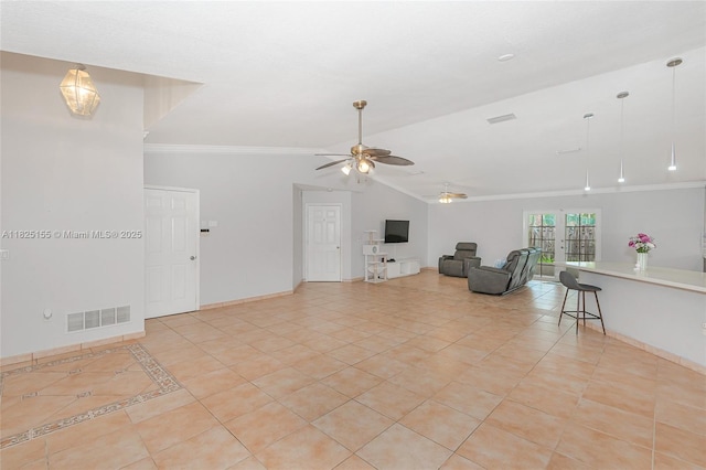 16859 Crestview Ln, Weston, FL 33326 - living room featuring ornamental molding, ceiling fan, vaulted ceiling, and light tile patterned floors
