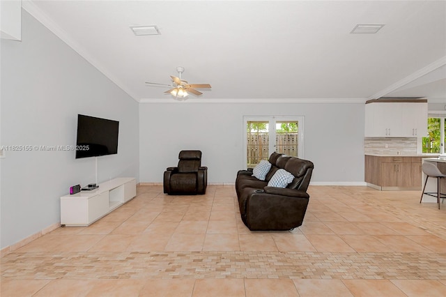 16859 Crestview Ln, Weston, FL 33326 - living room with a ceiling fan, light tile patterned floors, crown molding, and plenty of natural light
