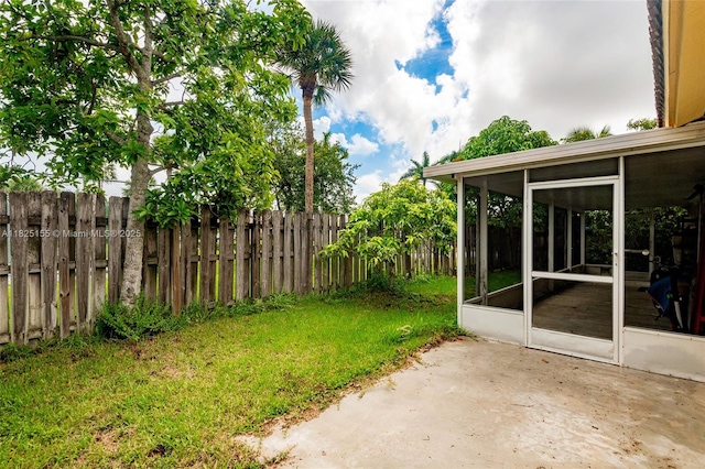 16859 Crestview Ln, Weston, FL 33326 - fenced backyard with a sunroom and a patio