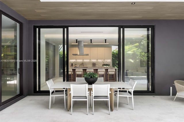 3670 Avocado Ave, Miami, FL 33133 - dining room featuring light carpet