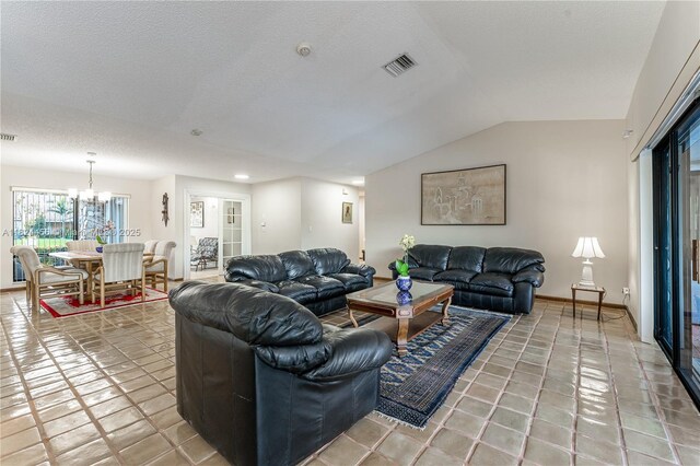 1460 NW 99th Ave, Plantation, FL 33322 - living area featuring lofted ceiling, a chandelier, tile patterned flooring, a textured ceiling, and recessed lighting