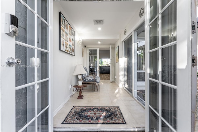 1460 NW 99th Ave, Plantation, FL 33322 - hallway with french doors and tile patterned floors
