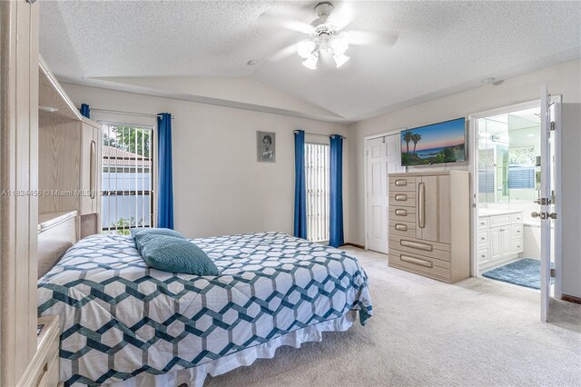 1460 NW 99th Ave, Plantation, FL 33322 - bedroom with light carpet, vaulted ceiling, a textured ceiling, a ceiling fan, and ensuite bathroom
