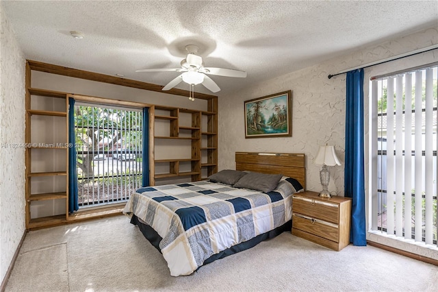 1460 NW 99th Ave, Plantation, FL 33322 - carpeted bedroom with a textured ceiling, access to exterior, and ceiling fan