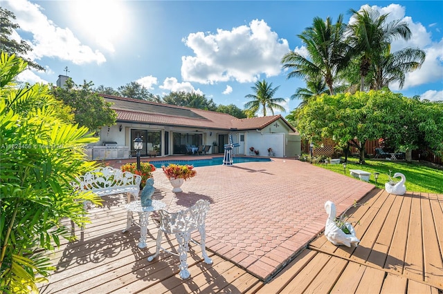 1460 NW 99th Ave, Plantation, FL 33322 - deck with an outdoor pool and a fenced backyard
