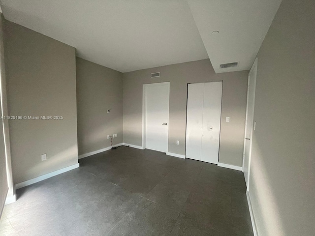 1300 S Miami Ave Unit 2304, Miami, FL 33130 - unfurnished bedroom featuring baseboards