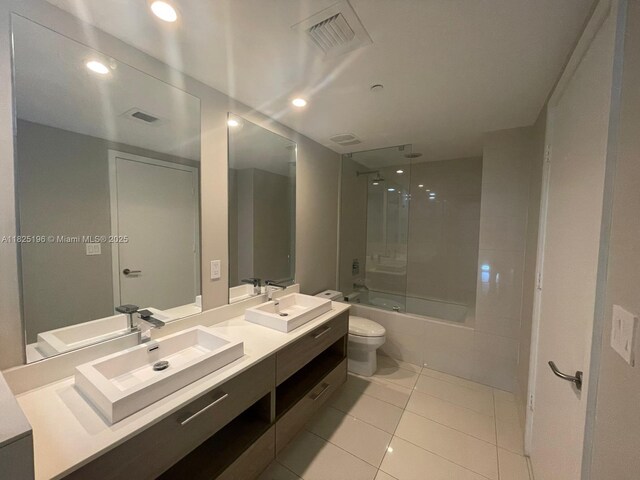1300 S Miami Ave Unit 2304, Miami, FL 33130 - full bath with double vanity,  shower combination, tile patterned floors, and recessed lighting