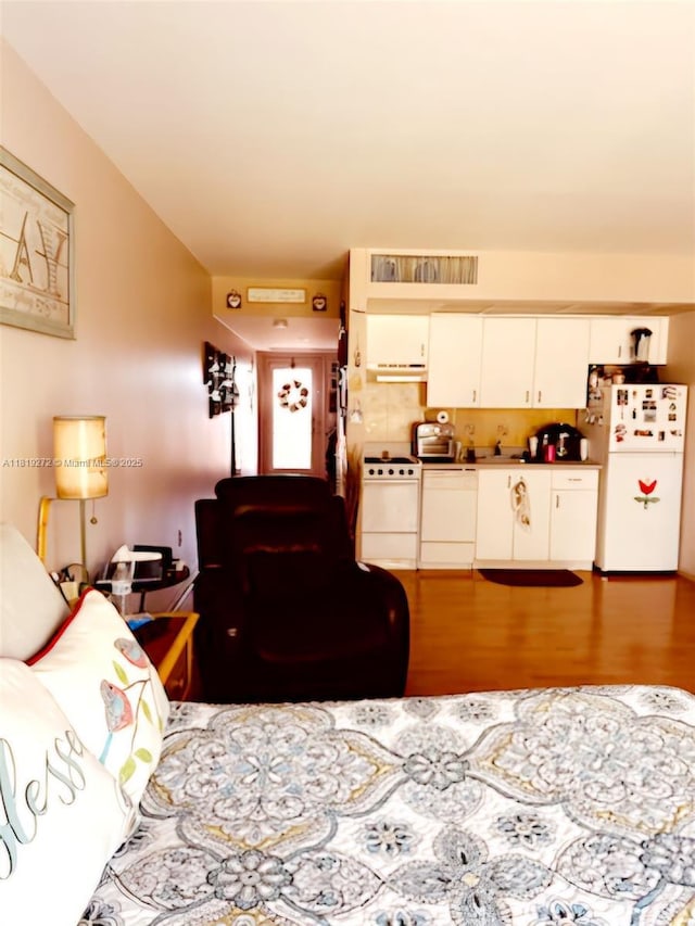 13455 SW 16th Ct Unit 304F, Pembroke Pines, FL 33027 - living area with wood finished floors