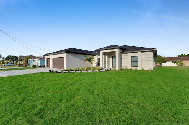 1520 NW 36th Pl, Cape Coral, FL 33993 - view of front of house with a front lawn, driveway, and an attached garage