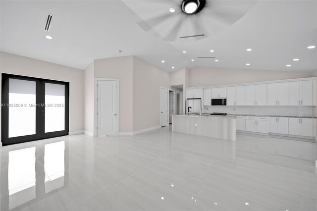 1520 NW 36th Pl, Cape Coral, FL 33993 - unfurnished living room featuring recessed lighting, ceiling fan, high vaulted ceiling, french doors, and light tile patterned flooring