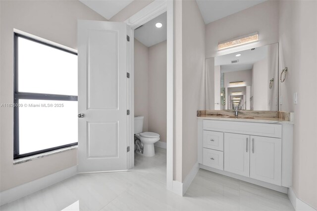 1520 NW 36th Pl, Cape Coral, FL 33993 - bathroom with toilet and vanity