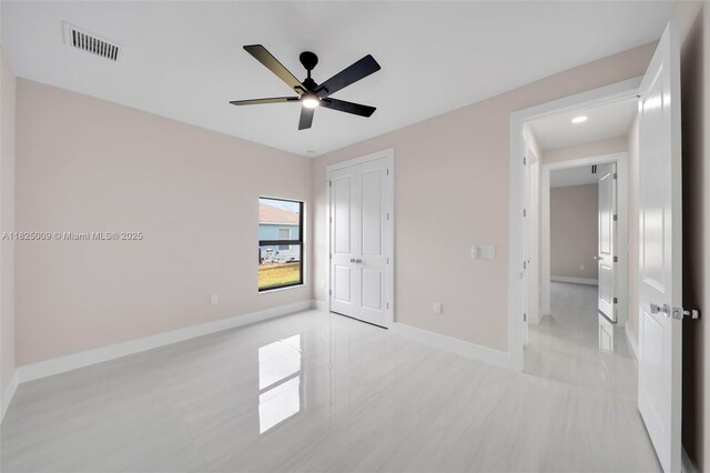 1520 NW 36th Pl, Cape Coral, FL 33993 - unfurnished bedroom with a closet and ceiling fan