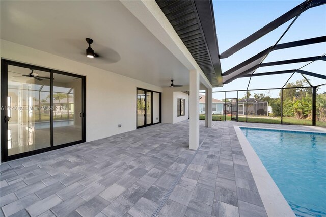 1520 NW 36th Pl, Cape Coral, FL 33993 - swimming pool with ceiling fan, a patio, and glass enclosure