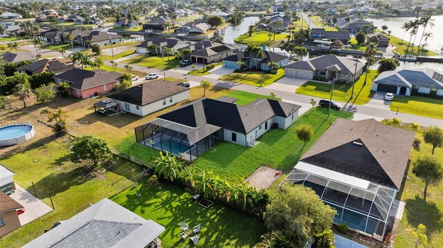 1520 NW 36th Pl, Cape Coral, FL 33993 - aerial view of residential area featuring a nearby body of water