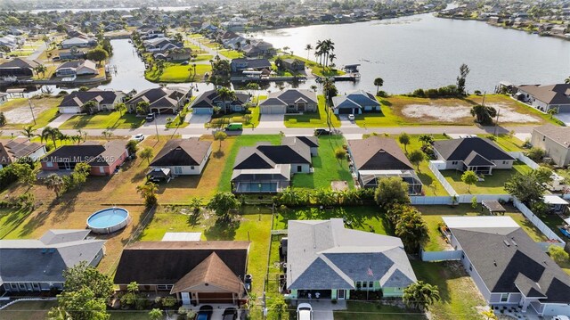 1520 NW 36th Pl, Cape Coral, FL 33993 - aerial view of residential area featuring a large body of water