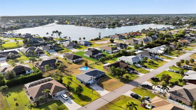 1520 NW 36th Pl, Cape Coral, FL 33993 - aerial perspective of suburban area featuring a large body of water