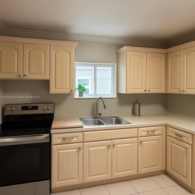 359 E 46th St, Hialeah, FL 33013 - kitchen with stainless steel electric range, light brown cabinets, light countertops, crown molding, and a textured ceiling
