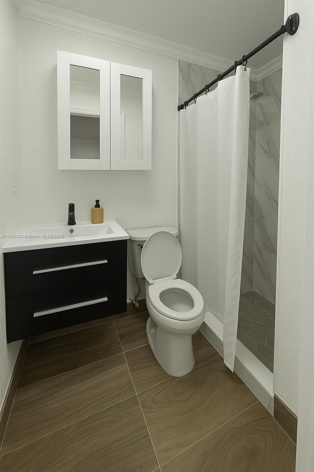 359 E 46th St, Hialeah, FL 33013 - bathroom with ornamental molding, vanity, and a stall shower