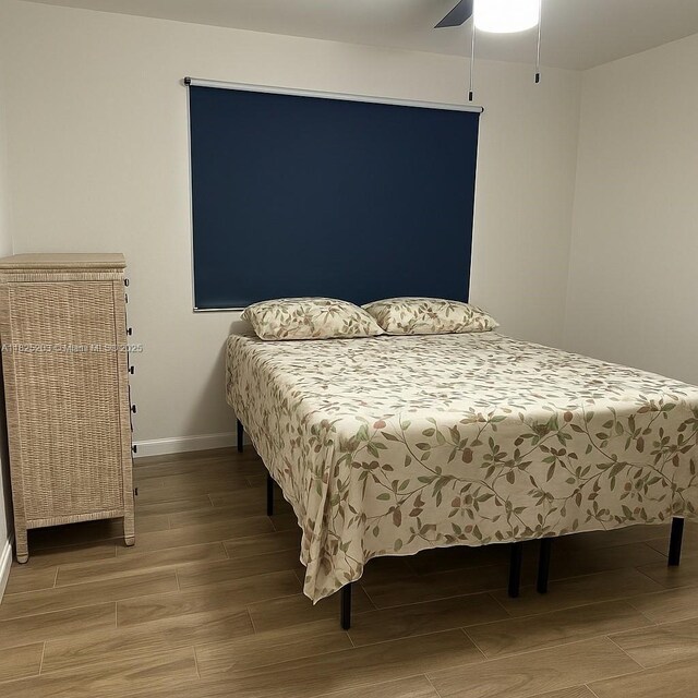 359 E 46th St, Hialeah, FL 33013 - bedroom featuring wood finish floors and ceiling fan